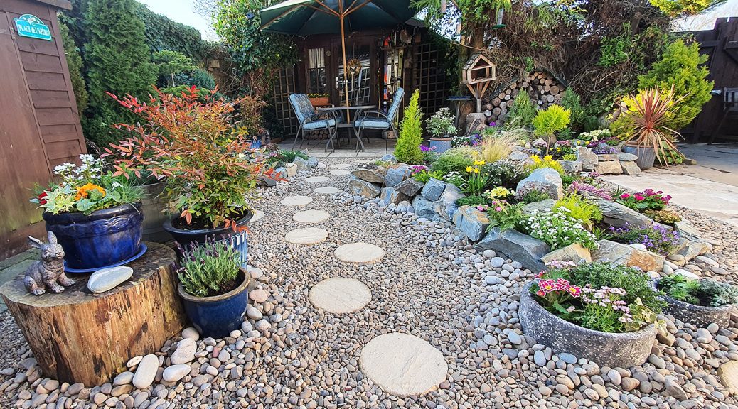 rockery garden with stepping stones and gravel